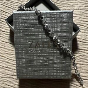 Zales Silver Bracelet, diamond cut design